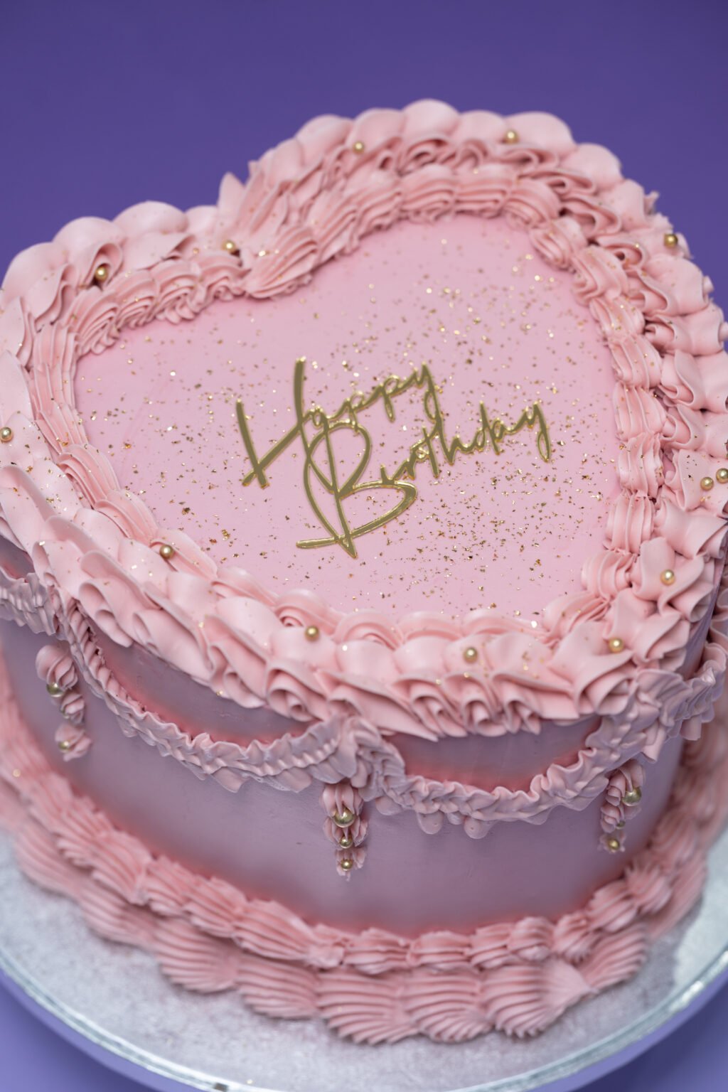 Gâteau cœur rose « Happy Birthday », réalisé à l’atelier Dream Pastry
